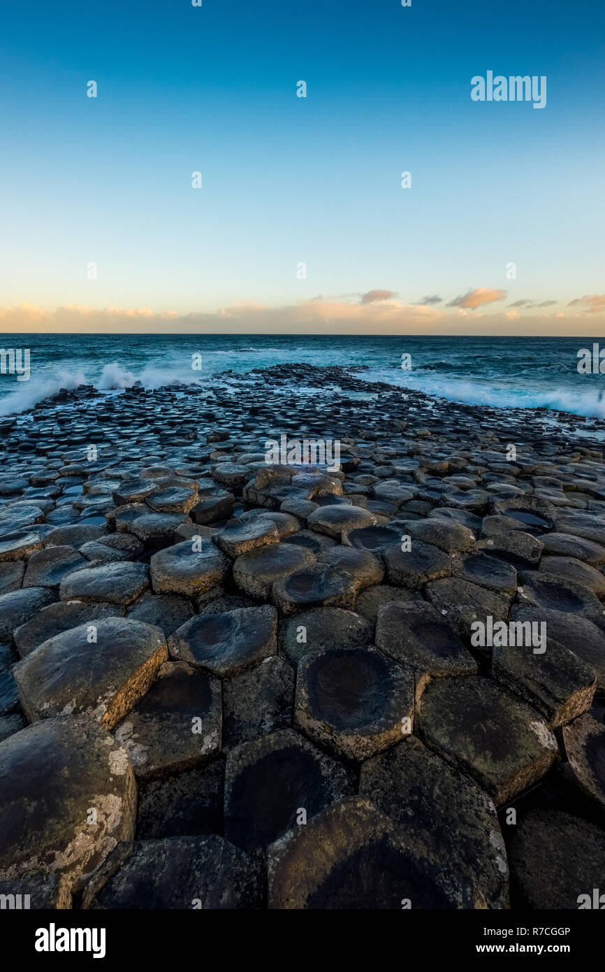 Landscape around Giant`s Causeway, A UNESCO world heritage site which has numbers of interlocking basalt columns result of an ancient volcanic fissure Stock Photo